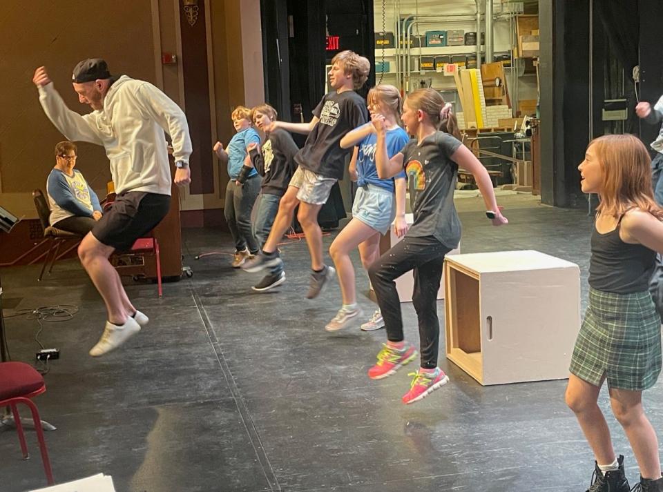 Kyle Aiden is volunteering his time this spring to put together the choreography for Aberdeen Community Theatre's production of "Matilda," which opens Tuesday. Behind Aiden from left are cast members Josiah Kollman, Peter Hemke, Damon Sheets, Charlie Hemke, Raylee Zimmer and Eden Barkmeier.