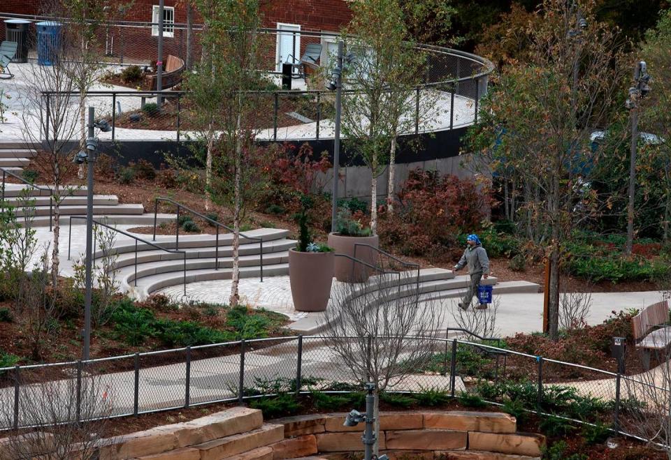 A person walks through Downtown Cary Park on Wednesday, Nov. 15, 2023, in Cary, N.C.