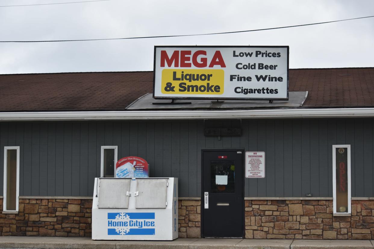 A Mega Liquor & Smoke store in South Bend. Bhola Singh, who owns 61 different stores in Indiana and Michigan under the Mega & Liquor name, was found to have retaliated against employees to whom he owed more than $350,000 in back wages and damages.