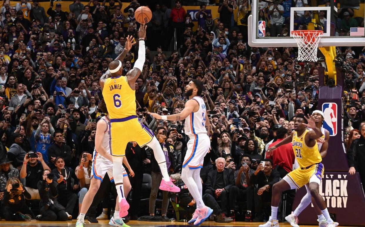 LeBron James becomes the NBA's all-time leading scorer/The picture that shows we no longer watch sport in person anymore - Andrew D Bernstein/Getty Images