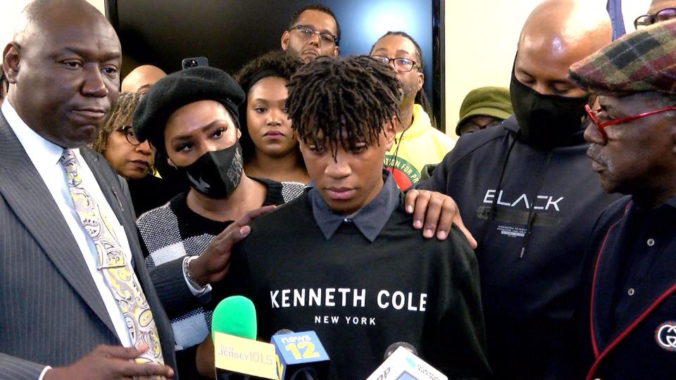 Z'Kye Husain is surrounded by his parents Ebone and Jihad as well as Civil rights attorney Ben Crump (left) and Rev. Steffie Bartley Sr., the Northeast Regional Director of the National Action Network, inside the Bridgewater Township, NJ, municipal building Wednesday, March 2, 2022.  Civil rights attorney Ben Crump claims that Z'Kye Husain was a victim of explicit bias and excessive force when he was slammed to the ground, face first, with a knee put on his back after a fight at the Bridgewater Mall.