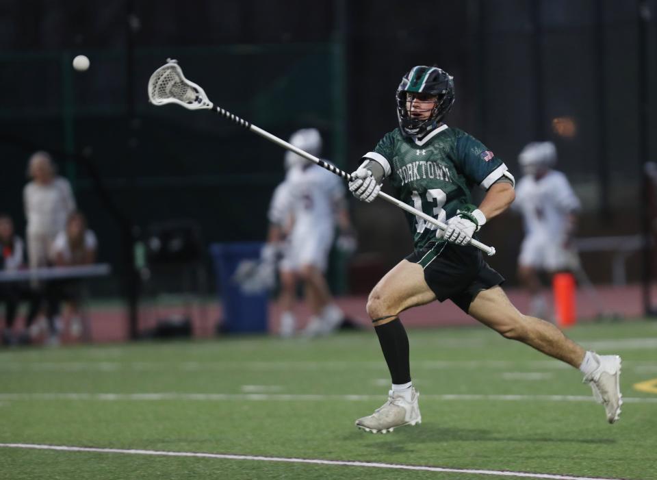 Chris Constantine and Yorktown defeated Scarsdale 8-7 in boys lacrosse action at Scarsdale High School April 12, 2023.