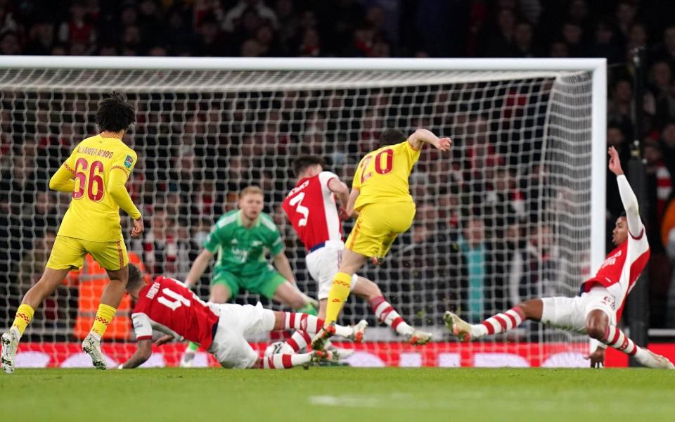 Liverpool's Diogo Jota (second right) scores their side's first goal of the game during the Carabao Cup semi final second leg match at the Emirates Stadium -  Adam Davy/PA Wire