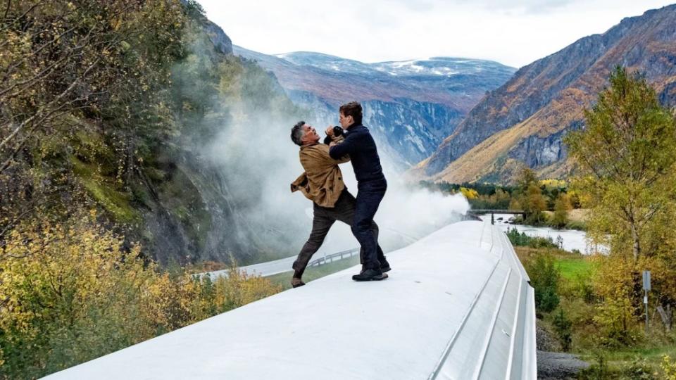 Tom Cruise and Esai Morales fight atop a moving train in “Mission: Impossible – Dead Reckoning Part One”