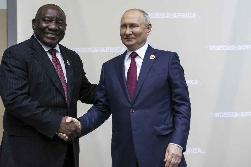 Russian President Vladimir Putin, right, and President of the Republic of South Africa Cyril Matamela Ramaphosa shake hands on the sideline of the Russia Africa Summit in St. Petersburg, Russia, Thursday, July 27, 2023. (Mikhail Metzel/TASS Host Photo Agency Pool Photo via AP)