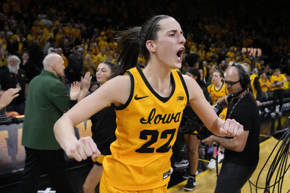 Iowa guard Caitlin Clark (22) celebrates after an NCAA college basketball game against Michigan State, Tuesday, Jan. 2, 2024, in Iowa City, Iowa. Iowa won 76-73. (AP Photo/Charlie Neibergall)