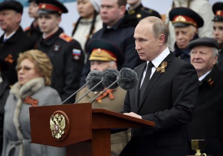 Russian President Vladimir Putin speaks during the Victory Day military parade marking the World War II anniversary at Red Square in Moscow. Sputnik/Aleksey Nikolskyi/Kremlin via REUTERS