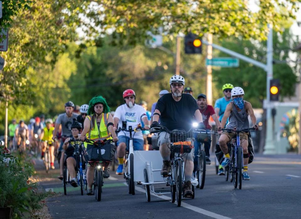 Jeff Parkin leads the “Ride of Silence” on 21st Street in midtown Sacramento on Wednesday remembering cyclists who have been killed on the city’s streets.