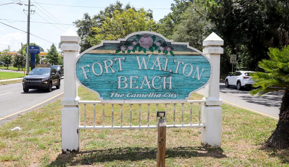 A sign on U.S. Highway 98 welcomes motorists to Fort Walton Beach. A report prepared for the Mary Esther City Council compares the cost of property tax rates and other services provided by local governments in Okaloosa County.