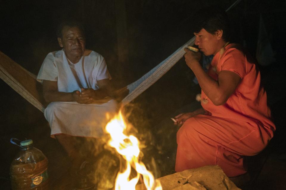 Healers of the Indigenous Siekopai ethnic group take part in an ayahuasca drinking ceremony in Peru. <a href="https://www.gettyimages.com/detail/news-photo/miguel-payaguaje-healer-of-the-indigenous-siekopai-ethnic-news-photo/1247423394?searchscope=image%2Cfilm&adppopup=true" rel="nofollow noopener" target="_blank" data-ylk="slk:Pedro Pardo/AFP via Getty Images;elm:context_link;itc:0;sec:content-canvas" class="link ">Pedro Pardo/AFP via Getty Images</a>