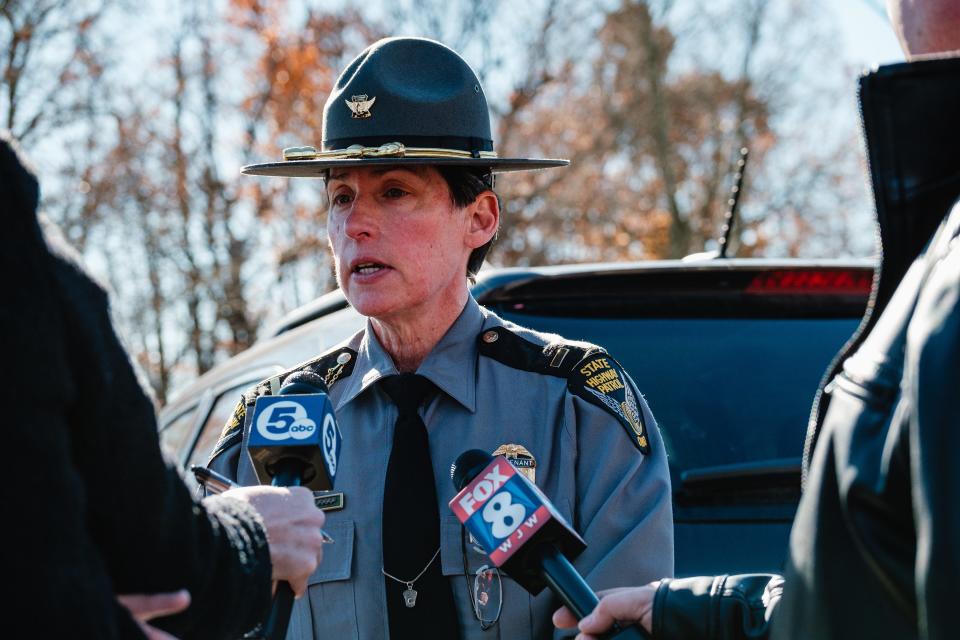 Lt. Laura Taylor, commander of the Ohio State Highway Patrol in New Philadelphia, talks with the media Tuesday outside Tuscarawas Valley Middle-High School in Zoarville.