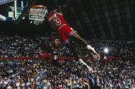 Michael Jordan elevates for a slam during the 1985 NBA Slam Dunk contest. (Getty Images)