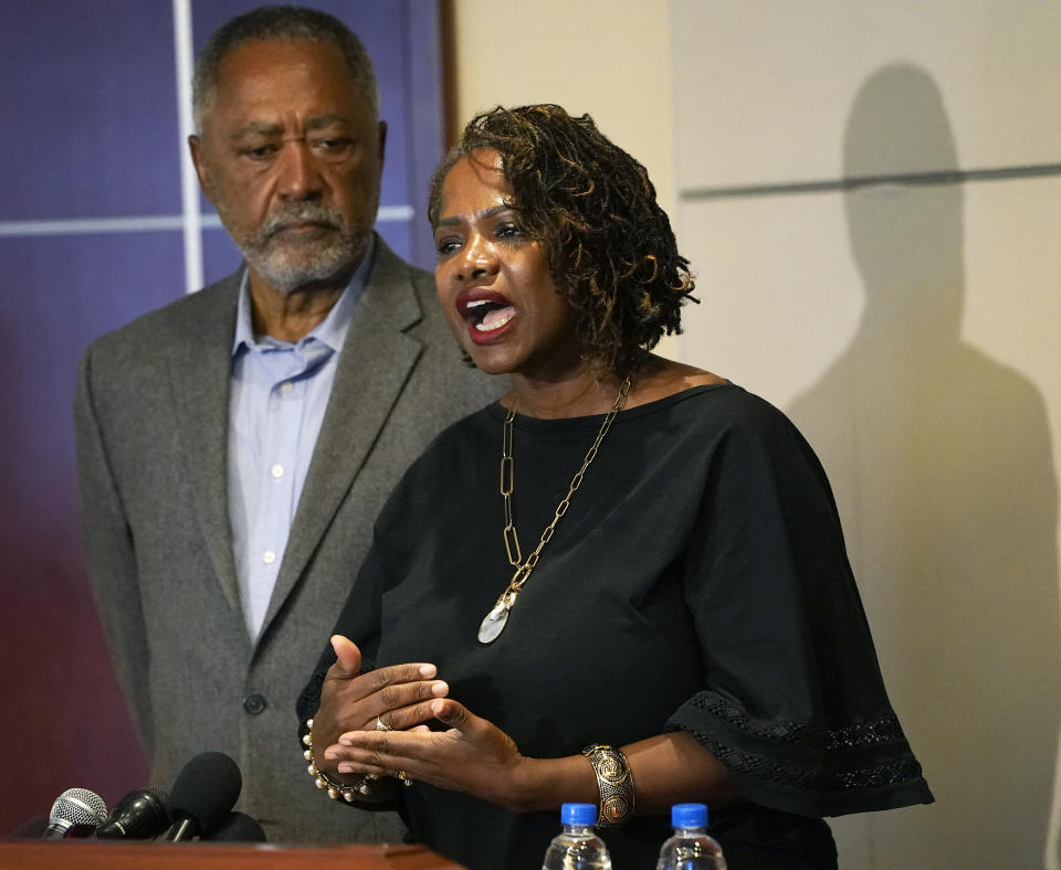 Minneapolis resident and former City Council Member Don Samuels listens as his wife Sondra speaks during a news conference at their attorney's office to discuss where the situation stands regarding language on the future of the Minneapolis policing ballot Wednesday, Sept. 15, 2021, in Minneapolis. A judge struck down ballot language last week that aimed to replace the Minneapolis Police Department with a new agency, which sent the City Council scrambling to approve new language that members hope will stand up. The injunction to keep the language off the ballot was sought by Samuels, his wife, and businessman Bruce Dachis. (David Joles/Star Tribune via AP)