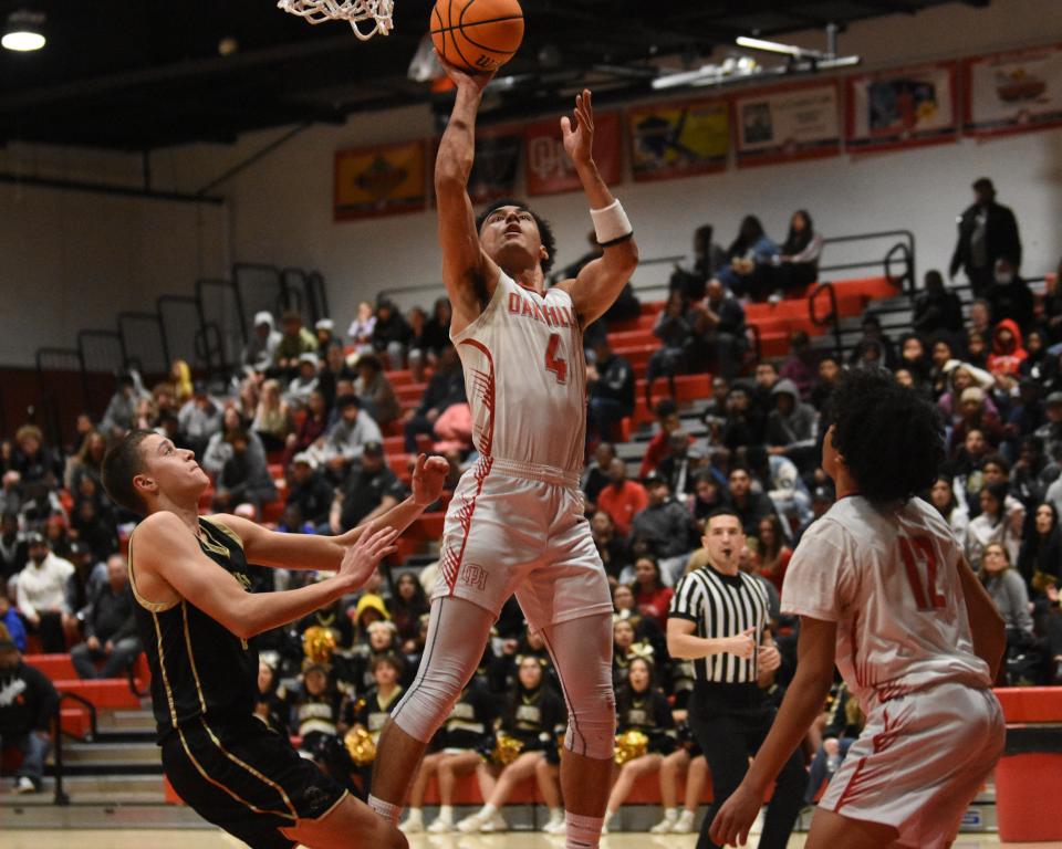 Oak Hill’s Isaiah Sharky shoots the ball during the fourth quarter against Hesperia on Friday, Feb, 2, 2024. Hesperia defeated Oak Hills 64-60 to capture the Mojave River League title.