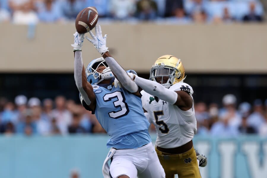 Cam Hart last season against North Carolina receiver Antoine Green.