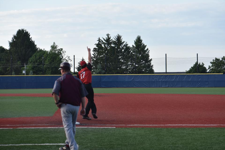 Morrisville-Eaton First Baseman Mason Coonrad puts up a #1 after he records the final out of Tuesday's win against Oriskany, which brought the Warriors to regionals and a battle with Deposit/Hancock.