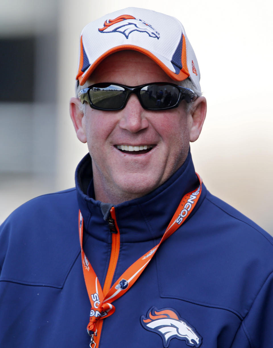 Denver Broncos head coach John Fox smiles as he talks to the media during practice for the football team's NFL playoff game against the San Diego Chargers at the Broncos training facility in Englewood, Colo., Friday, Jan. 10, 2014. (AP Photo/Ed Andrieski)