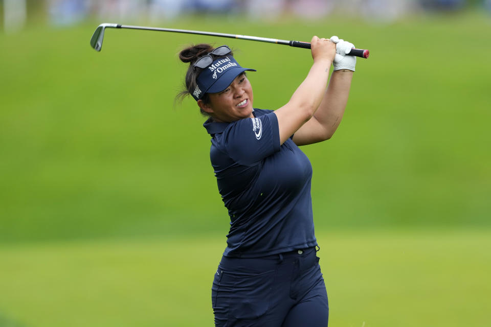 Megan Khang hits out of the rough on the 18th hole during the third round of the Women's PGA Championship golf tournament, Saturday, June 24, 2023, in Springfield, N.J. (AP Photo/Matt Rourke)