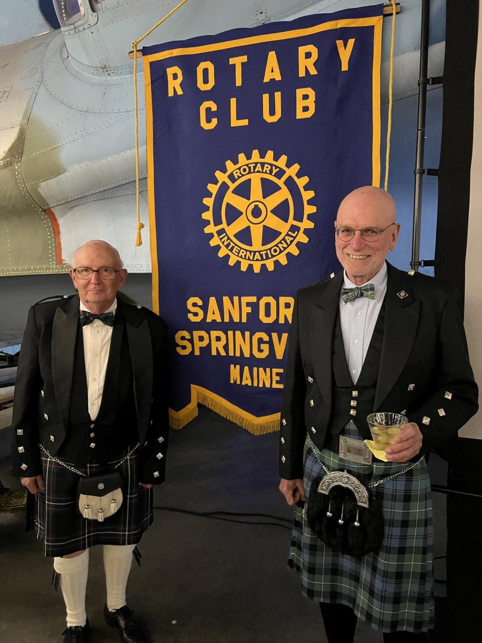 Rotarians Bob Ferguson, left, and Lawrence Furbish are seen during the Sanford-Springvale Rotary Club's 100th anniversary celebration at Sanford Seacoast Regional Airport on Saturday, Sept. 16, 2023.