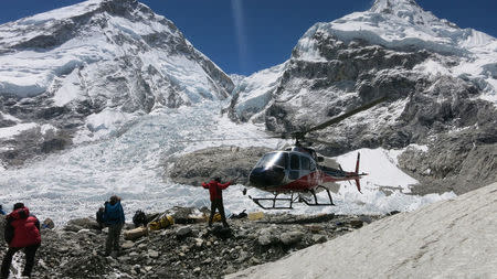 A rescue helicopter prepares to land at basecamp at Everest, in this picture taken on May 23, 2016. Phurba Tenjing Sherpa/Handout via REUTERS