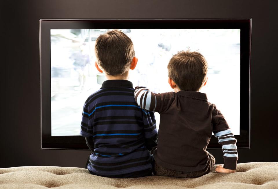 <span class="caption">On the news channels, coverage of the pandemic seems 24/7. </span> <span class="attribution"><a class="link " href="https://www.gettyimages.com/detail/photo/brothers-watching-tv-royalty-free-image/94985907?adppopup=true" rel="nofollow noopener" target="_blank" data-ylk="slk:Getty Images / Chris Stein;elm:context_link;itc:0;sec:content-canvas">Getty Images / Chris Stein</a></span>