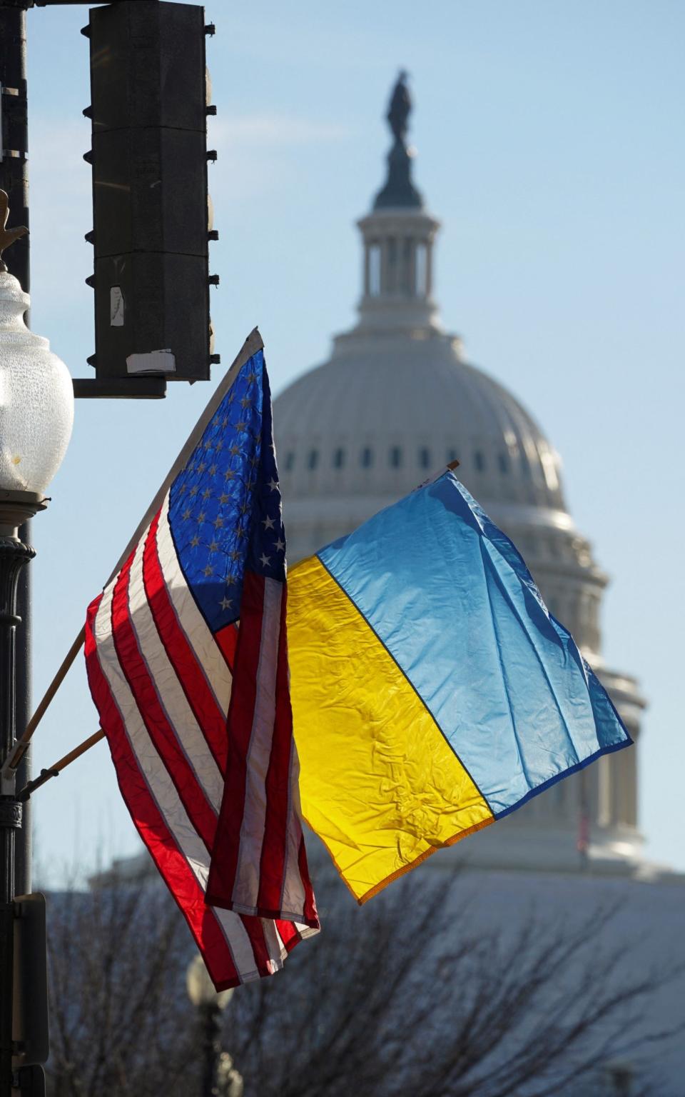 American and Ukrainian flags went up around the US capital ahead of Mr Zelensky's visit. - Reuters