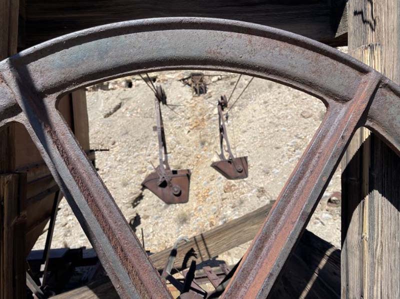 Ore buckets on an aerial tram at Big Bell Mine, above Keane Wonder Mine. (Photo: National Park Service)