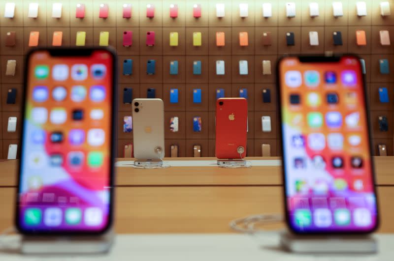 FILE PHOTO: IPhones are displayed at the upcoming Apple Marina Bay Sands store in Singapore