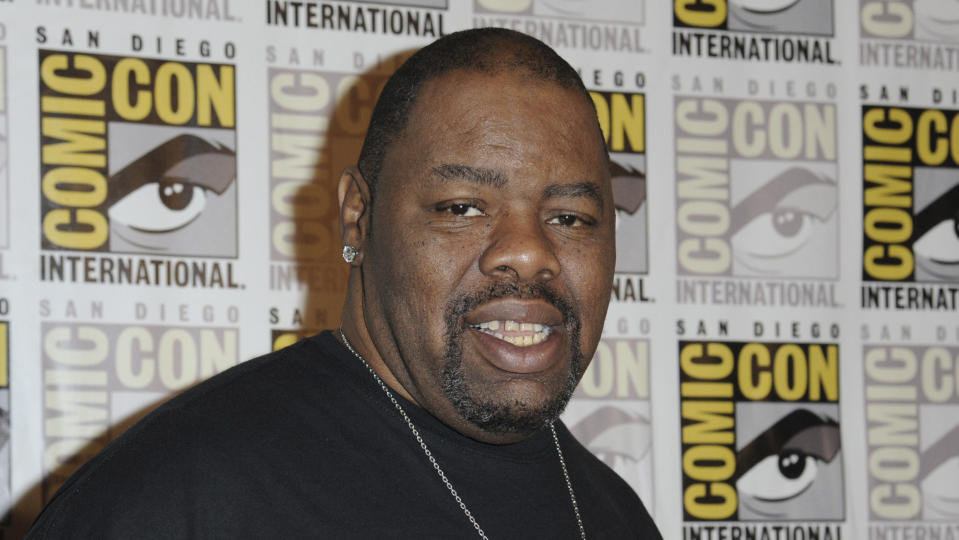 FILE - Biz Markie attends the 20th Century Fox press line on Day 2 of Comic-Con International on July 25, 2014, in San Diego. The hip-hop staple known for his beatboxing prowess, turntable mastery and the 1989 classic “Just a Friend,” has died. He was 57. Markie’s representative, Jenni Izumi, said in a statement that the rapper-DJ died peacefully Friday, July 16, 2021, with his wife by his side. No cause of death was released. (Photo by Richard Shotwell/Invision/AP, File)