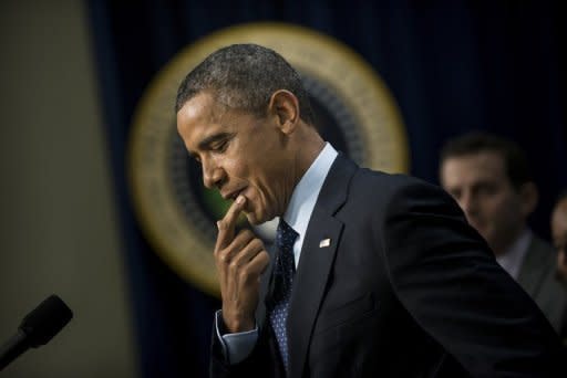 US President Barack Obama pauses while speaking about the ongoing fiscal cliff negotiations from the White House in Washington on December 31, 2012. US lawmakers missed their deadline to avoid the so-called "fiscal cliff" Monday but said they were near to finding a deal to ease the worst impact of the crisis by heading off tax hikes.