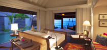 <p><b>16. Naladhu Maldives</b></p>Located in South Male Atoll, Maldives, Naladhu Maldives follows with an average price of $1540 per night. This resort is considered to be yet another hideaway which will unwind you in free-flowing space in the paradise of the Maldives.<p>(Image source: Hotel website)</p>