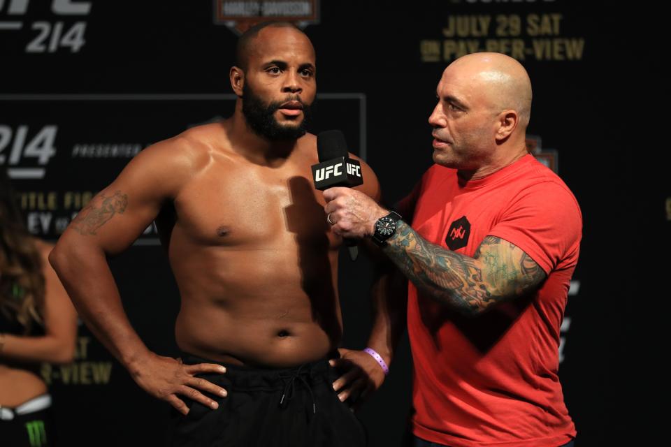 ANAHEIM, CA – JULY 28: (L-R) Daniel Cormier speaks with commentator Joe Rogan during the UFC 214 weigh-in at Honda Center on July 28, 2017 in Anaheim, California. Cormier is fighting Jon Jones in the light heavyweight title bout. (Photo by Sean M. Haffey/Getty Images)