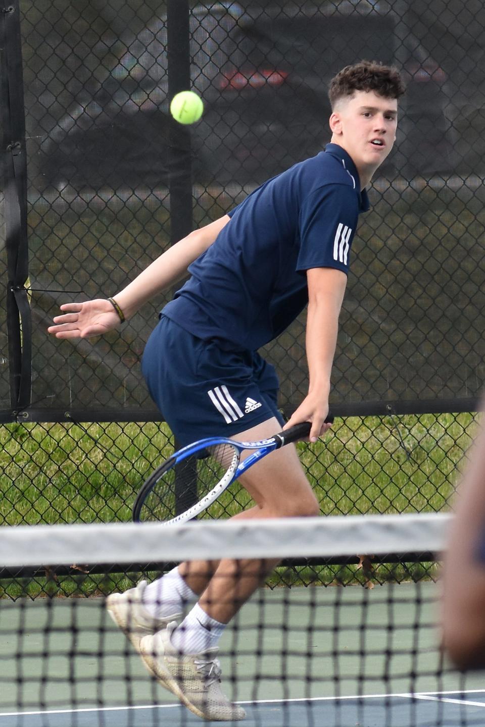 Somerset Berkley second doubles player Ian Sullivan backhands a shot over the net in Thursday's match against Seekonk at Chapman Courts in Somerset.