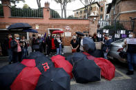 Women stage a protest against the tightening of Poland’s already restrictive abortion law, in front of the Polish Embassy in Rome, Wednesday, Oct. 28, 2020. Poland’s constitutional court declared that aborting fetuses with congenital defects is unconstitutional. Poland already had one of Europe’s most restrictive abortion laws, and the ruling will result in a near-complete ban on abortion. (Cecilia Fabiano/LaPresse via AP)