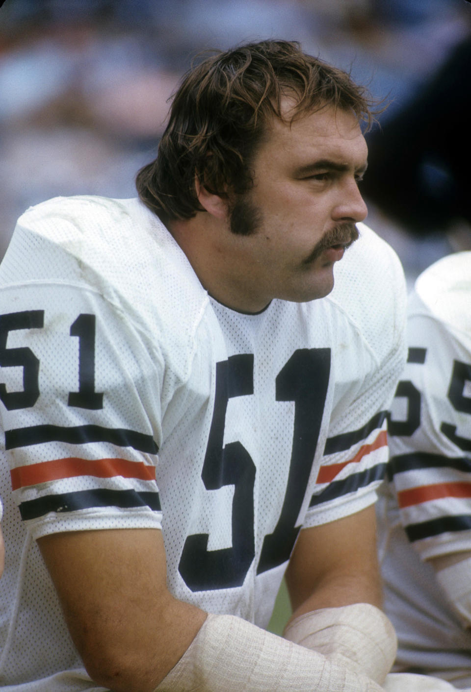 ATLANTA, GA - CIRCA 1970: Linebacker Dick Butkus #51 of the Chicago Bears in this portrait watching the action from the bench against the Atlanta Falcons during an NFL football game circa 1970 at Atlanta-Fulton County Stadium in Atlanta, Georgia. Butkus played for the Bears from 1965-73. / Credit: Focus On Sport / Getty Images
