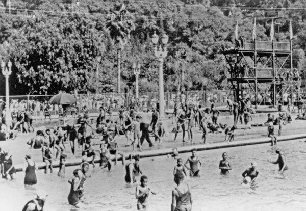 In the early 1900s, Pasadena mostly prohibited people of color from swimming in the Brookside Plunge. Sammy Lee, the first Asian American to win an Olympic medal for the U.S., would learn to dive there. Because of limited access, he had to train with a fake diving board and a sandpit pool in a coach’s backyard.