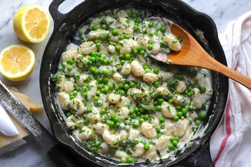 <p>The Hungry Hutch</p><p>This recipe combines store-bought gnocchi and peas in a cheesy, lemony cream sauce that is sure to comfort your stomach and your soul.</p><p><strong>Get the Recipe: </strong><a href="https://www.thehungryhutch.com/gnocchi-peas-lemon-cream-sauce-recipe/" rel="nofollow noopener" target="_blank" data-ylk="slk:Gnocchi with Peas and Lemon Cream Sauce;elm:context_link;itc:0;sec:content-canvas" class="link "><strong>Gnocchi with Peas and Lemon Cream Sauce</strong></a></p>