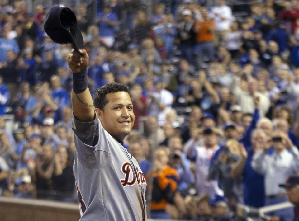 FILE - Detroit Tigers' Miguel Cabrera waves to the crowd after being replaced during the fourth inning of a baseball game against the Kansas City Royals at Kauffman Stadium in Kansas City, Mo., Oct. 3, 2012. Cabrera, one of the greatest hitters of all time, is retiring after the Tigers wrap up their season Sunday, Oct. 1, 2023, and baseball’s last Triple Crown winner is leaving a lasting legacy in the game and his native Venezuela. (AP Photo/Orlin Wagner, File)