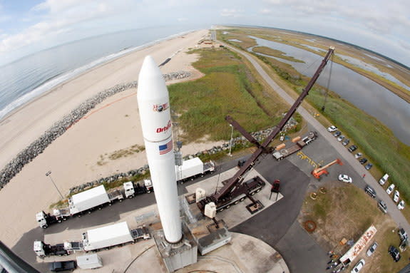 A wide-angle view of an inert Minotaur V launch vehicle is erected on the Mid-Atlantic Regional Spaceport's pad 0B at NASA's Wallops Flight Facility in Virginia during a pathfinder exercise for NASA's Lunar Atmosphere and Dust Environment Explo