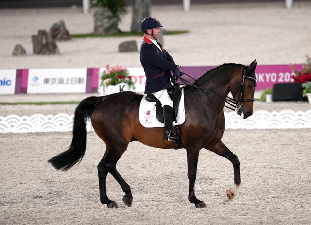 Great Britain’s Lee Pearson won three golds on homebred horse Breezer