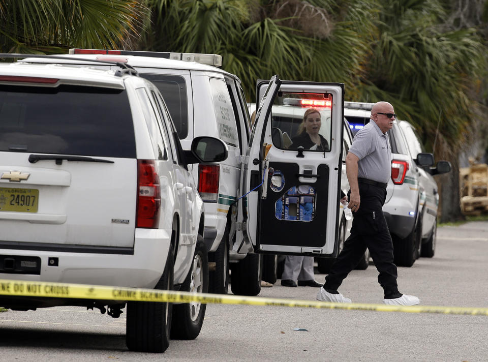 <p>Crime scene investigators prepare to enter the scene of a shooting where there were multiple fatalities in an industrial area near Orlando, Fla., Monday, June 5, 2017. The Orange County Sheriff’s Office said on its official Twitter account that the situation has been contained. (AP Photo/John Raoux) </p>