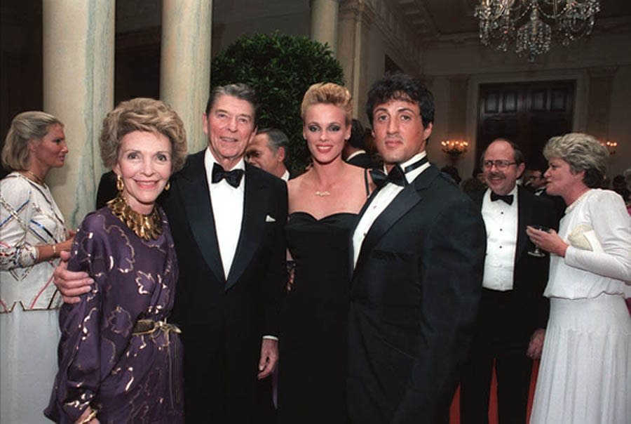 Nancy and Ronald Reagan and Brigitte Nielsen and Sylvester Stallone at a White House State Dinner in 1984. President Reagan often made references to 'First Blood Part II' in various speeches. (Photo: Courtesy Everett Collection)