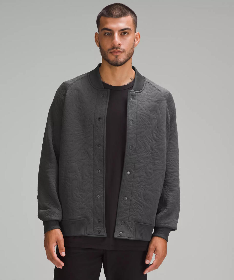 someone wearing the Packable Jacquard Knit Bomber Jacket