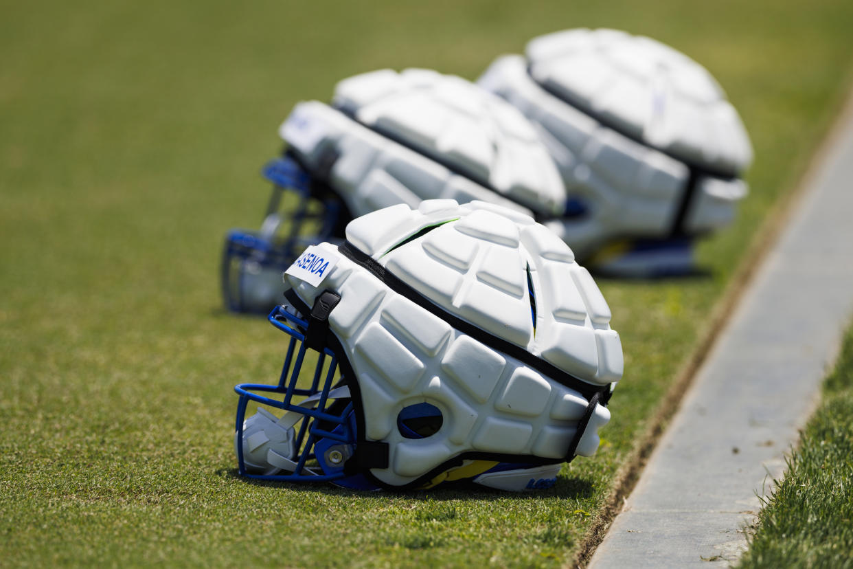 Los Angeles Rams helmets with Guardian Caps during a team activity in June. 