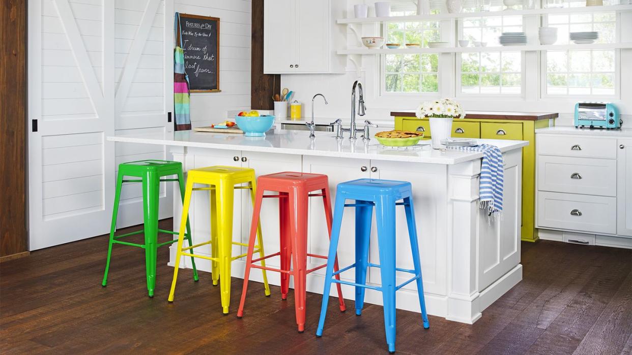 kitchen with multicolor aluminum bar stools