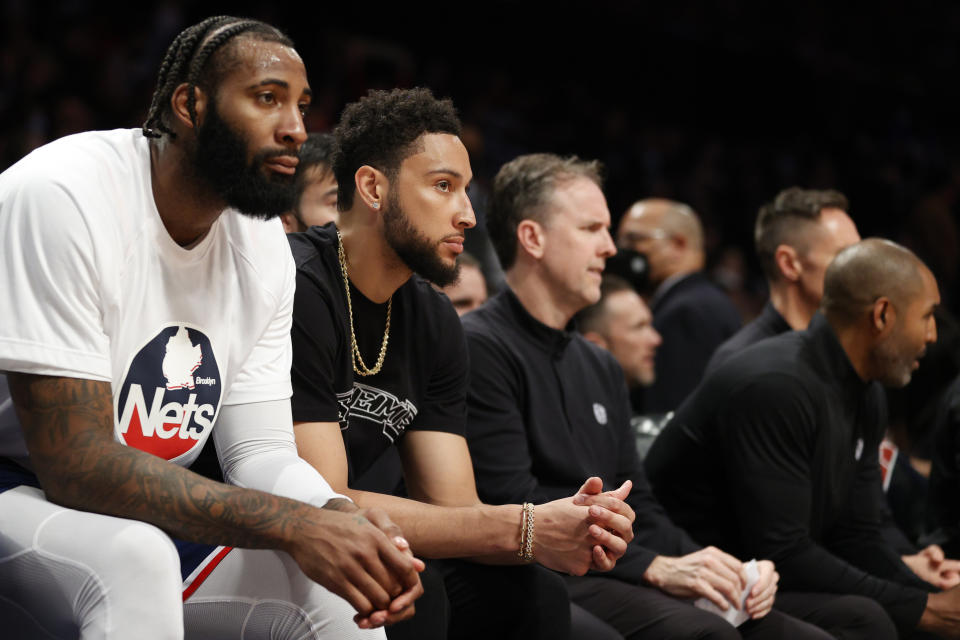 Andre Drummond and Ben Simmons, pictured here watching from the bench during the regular season.