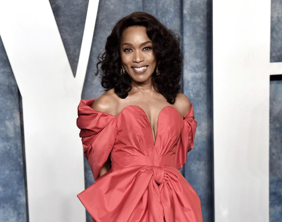 FILE - Angela Bassett arrives at the Vanity Fair Oscar Party in Beverly Hills, Calif.,on March 12, 2023. The Academy of Motion Picture Arts and Sciences announced Monday that Bassett, Mel Brooks and film editor Carol Littleton will receive honorary Oscars at November's Governors Awards.(Photo by Evan Agostini/Invision/AP, File)