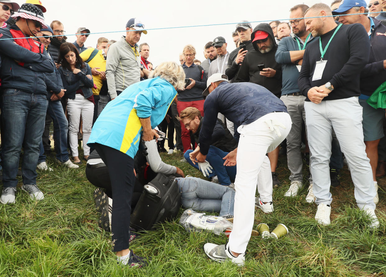 <span>Brooks Koepka</span> went to check on a woman who was hit in the eye by a stray shot at the Ryder Cup. (Photo: Getty Images).