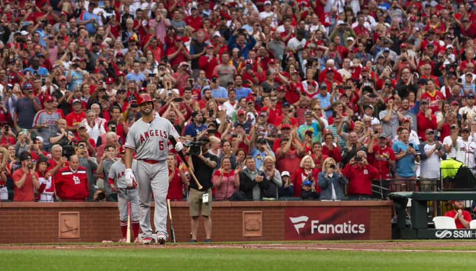 Los Angeles Angels' Albert Pujols (5) is greeted by a standing ovation before his first at-bat during the first inning a baseball game against the St. Louis Cardinals, Friday, June 21, 2019, in St. Louis. (AP Photo/L.G. Patterson)