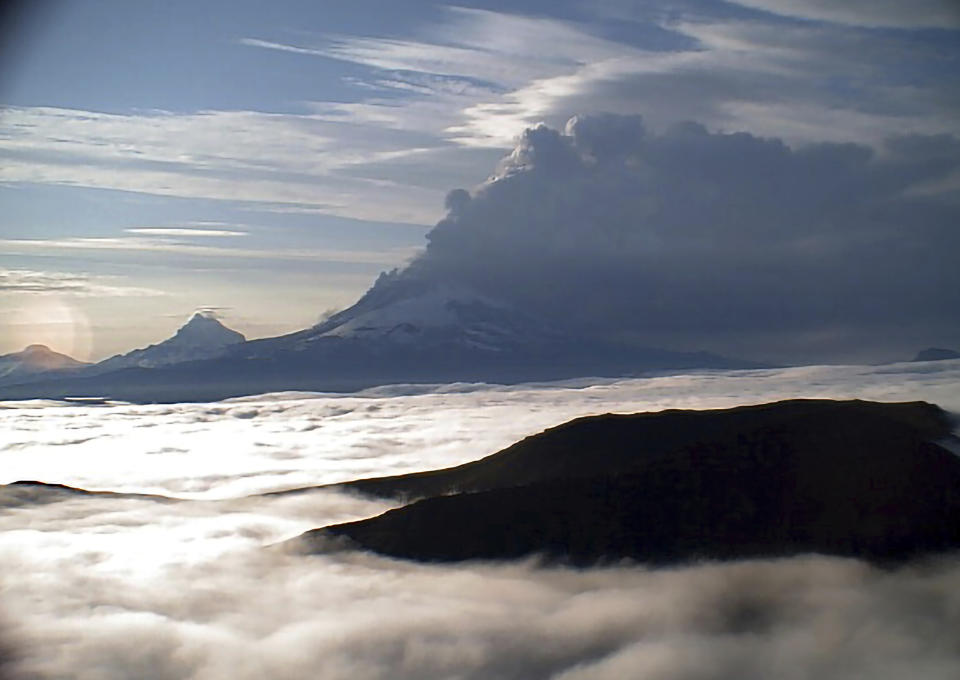 This web camera image provided by the U.S. Geological Survey shows a low-level ash plume from the Shishaldin Volcano captured on Tuesday, July 18, 2023. An ongoing eruption of a remote volcano in Alaska's Aleutian Islands produced an ash cloud so large Tuesday warnings were sent to pilots about potentially dangerous conditions.(Alaska Volcano Observatory/U.S. Geological Survey via AP)